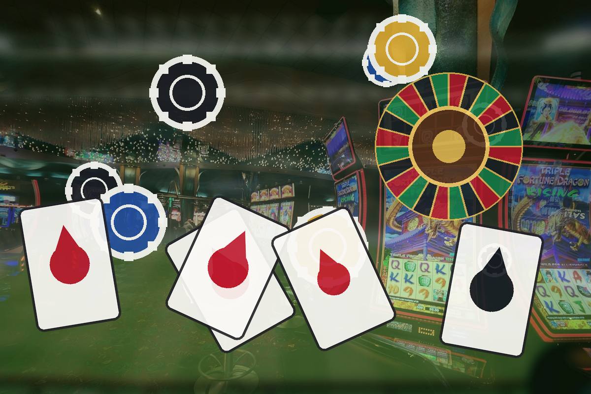 Cards with red blood-drop symbols on a casino floor, with a colorful roulette wheel in the background.